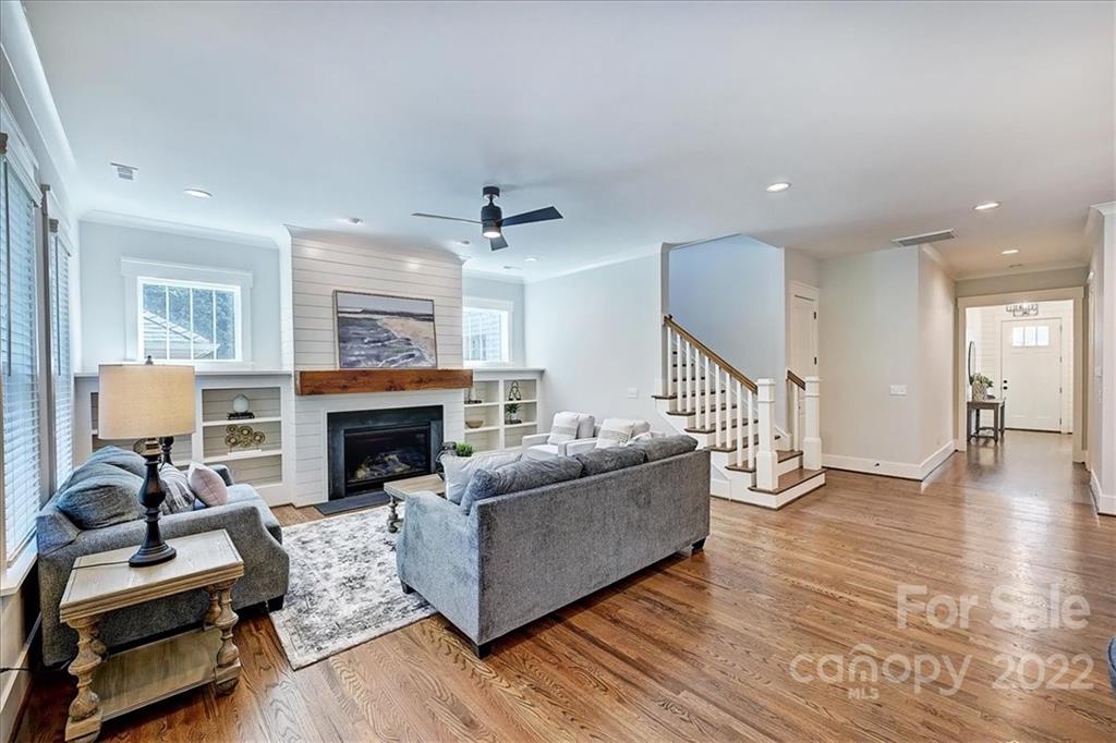 911 Millbrook Road Charlotte, NC 28211 - Photo 20 of 43 a living room with furniture and a fireplace