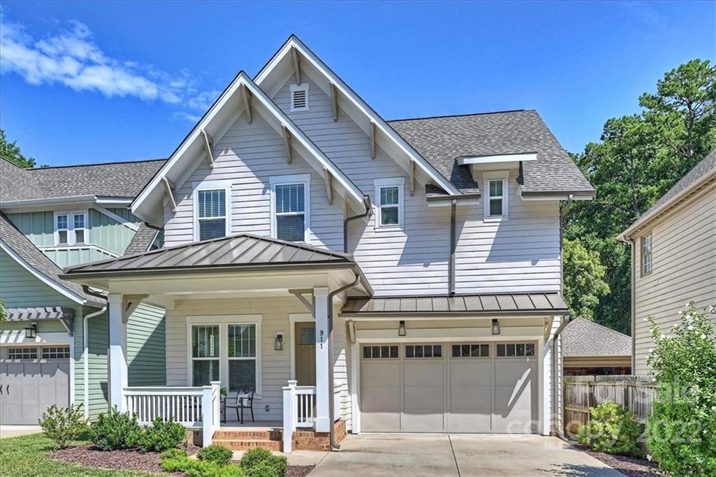 911 Millbrook Road Charlotte, NC 28211 - Photo 2 of 43 a view of a house with a yard
