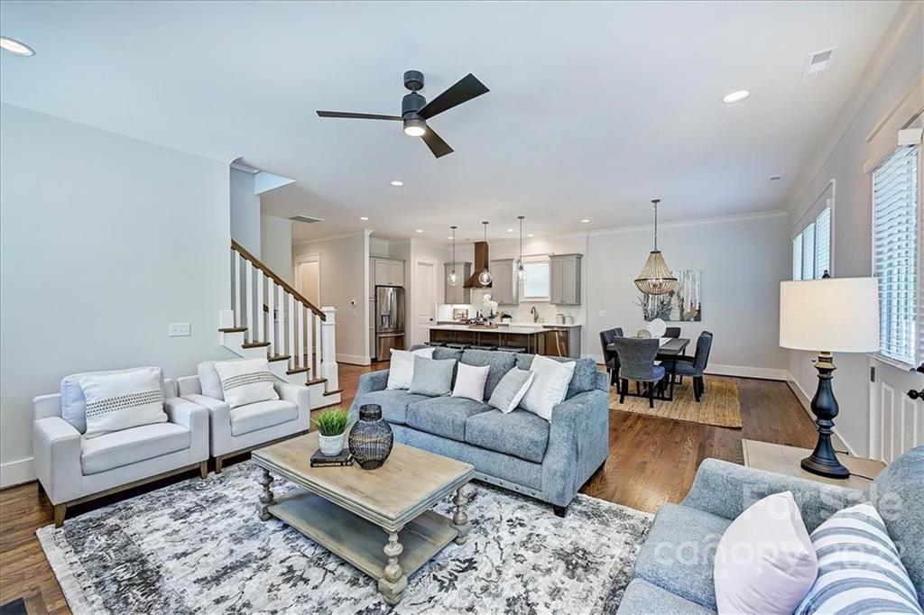 911 Millbrook Road Charlotte, NC 28211 - Photo 22 of 43 a living room with furniture and a view of kitchen