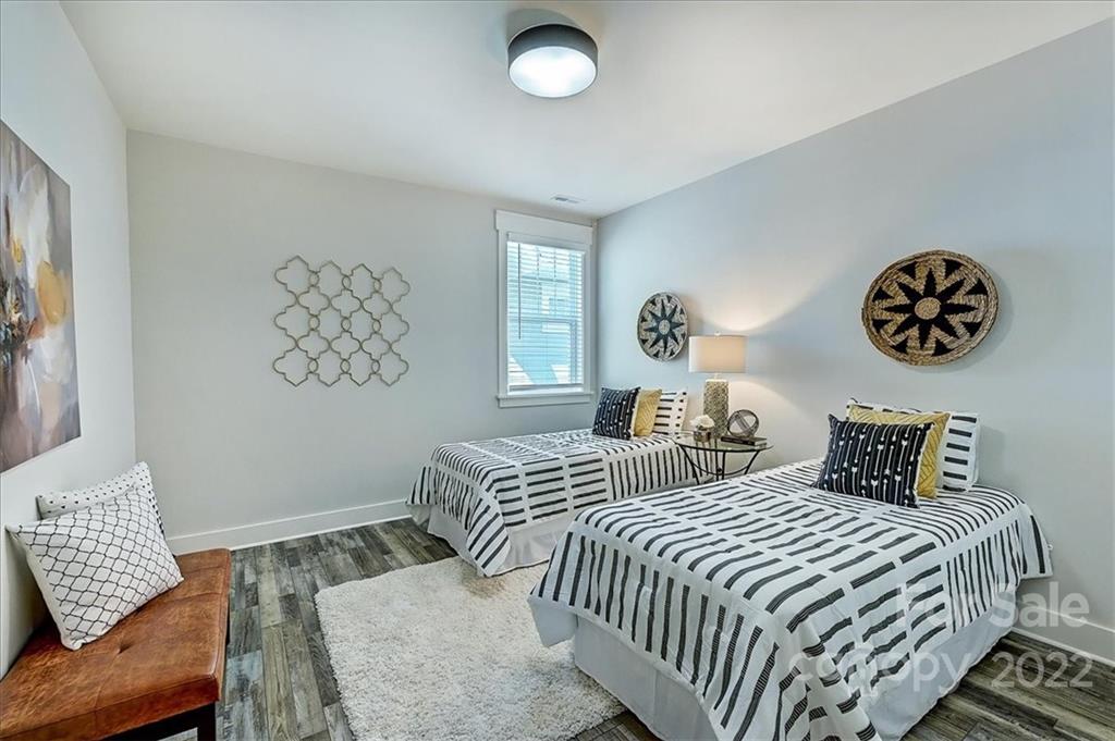 911 Millbrook Road Charlotte, NC 28211 - Photo 36 of 43 a bedroom with two beds and a couch