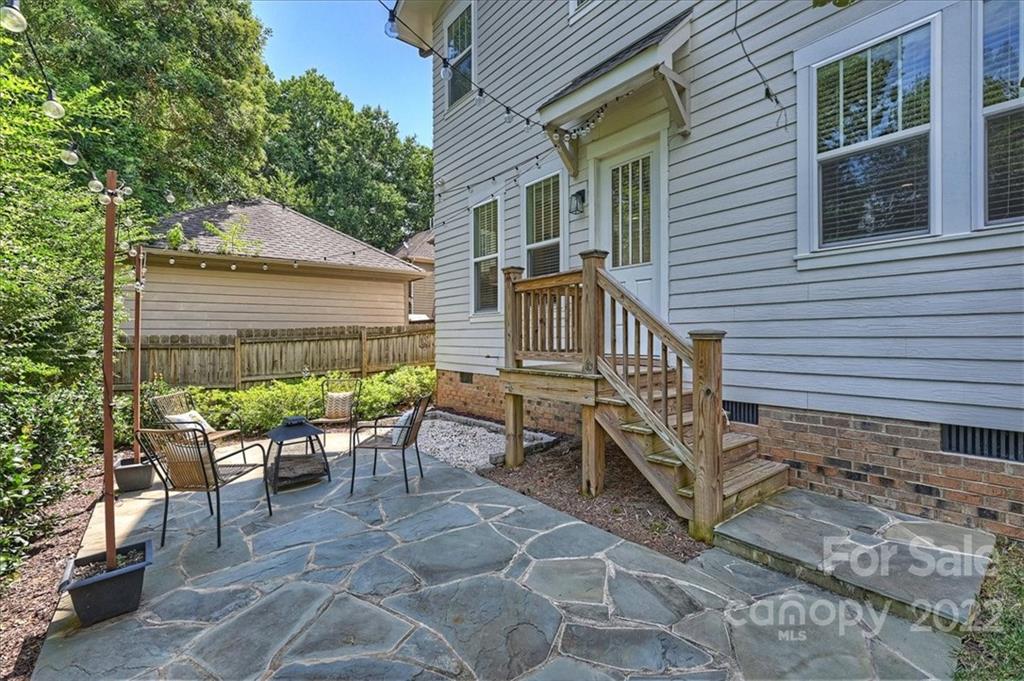 911 Millbrook Road Charlotte, NC 28211 - Photo 42 of 43 a view of a house with backyard and sitting area