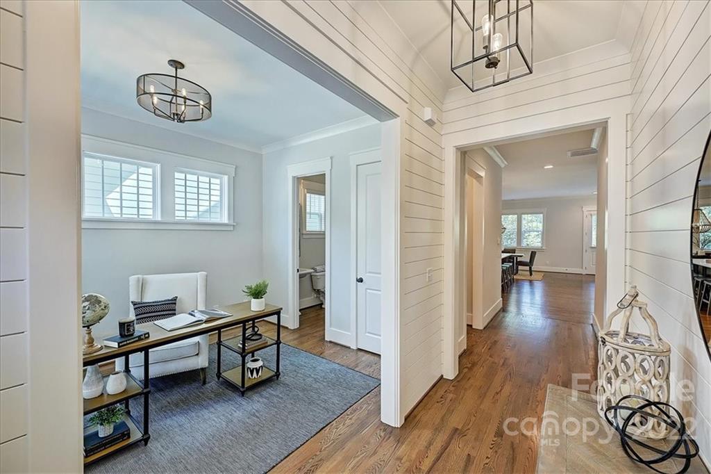 911 Millbrook Road Charlotte, NC 28211 - Photo 5 of 43 a living room with furniture and a table