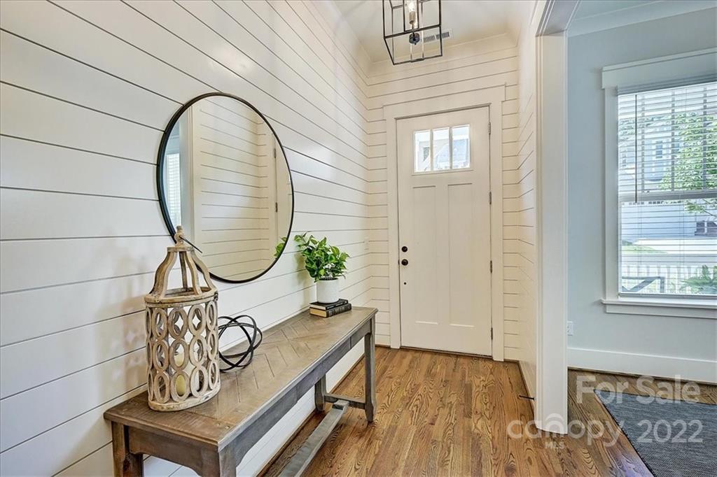 911 Millbrook Road Charlotte, NC 28211 - Photo 6 of 43 stairs with wooden floor