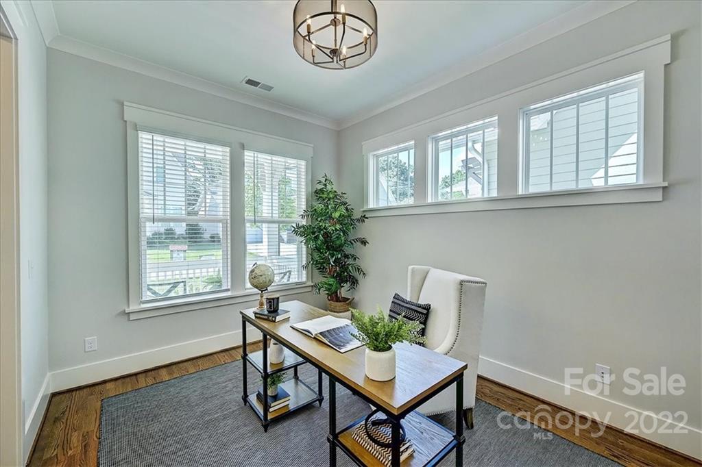 911 Millbrook Road Charlotte, NC 28211 - Photo 7 of 43 a living room with furniture and a window