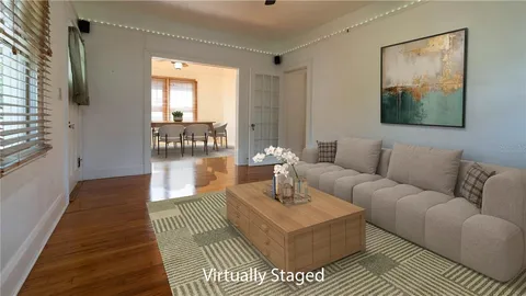 a view of a porch with wooden floor and outdoor space
