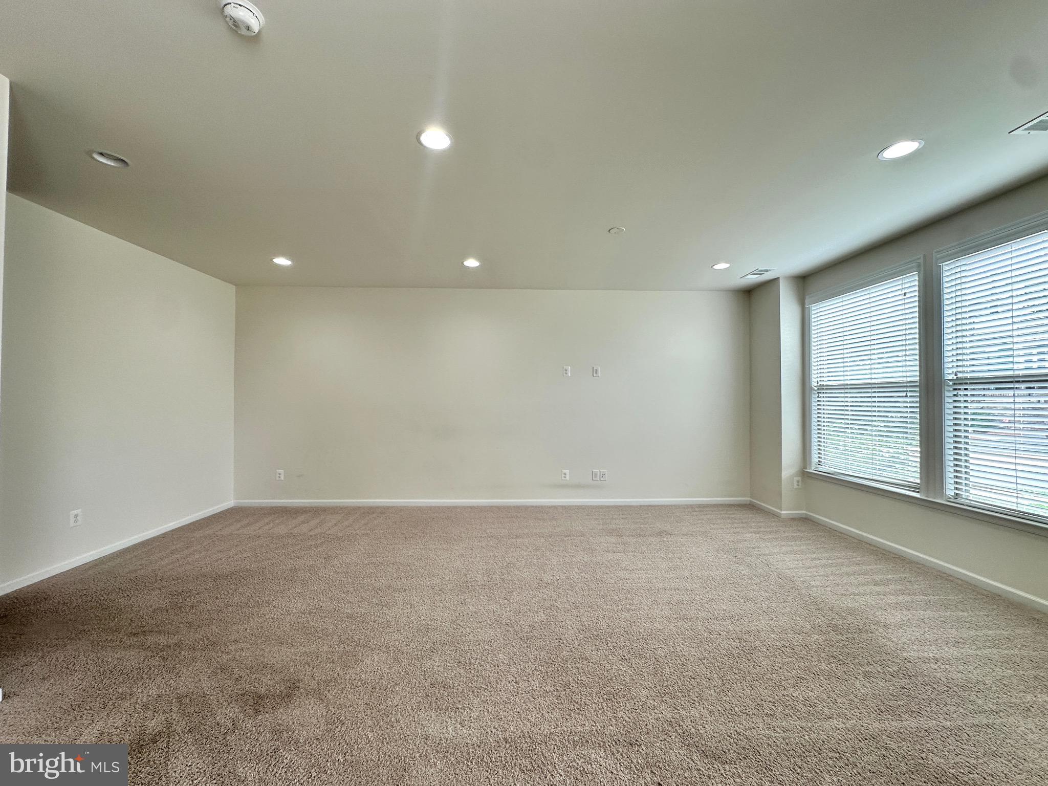 23451 Epperson Square Brambleton, VA 20148 - Photo 2 of 42 an empty room with windows