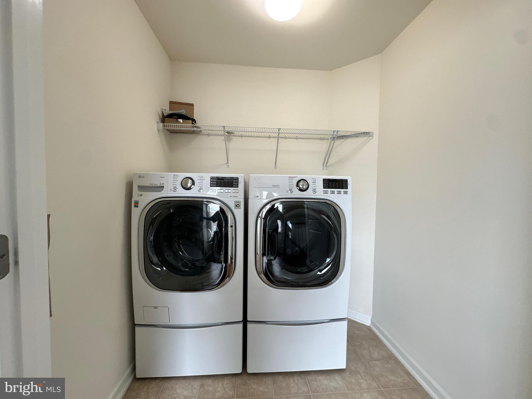 23451 Epperson Square Brambleton, VA 20148 - Photo 31 of 42 a utility room with dryer and washer