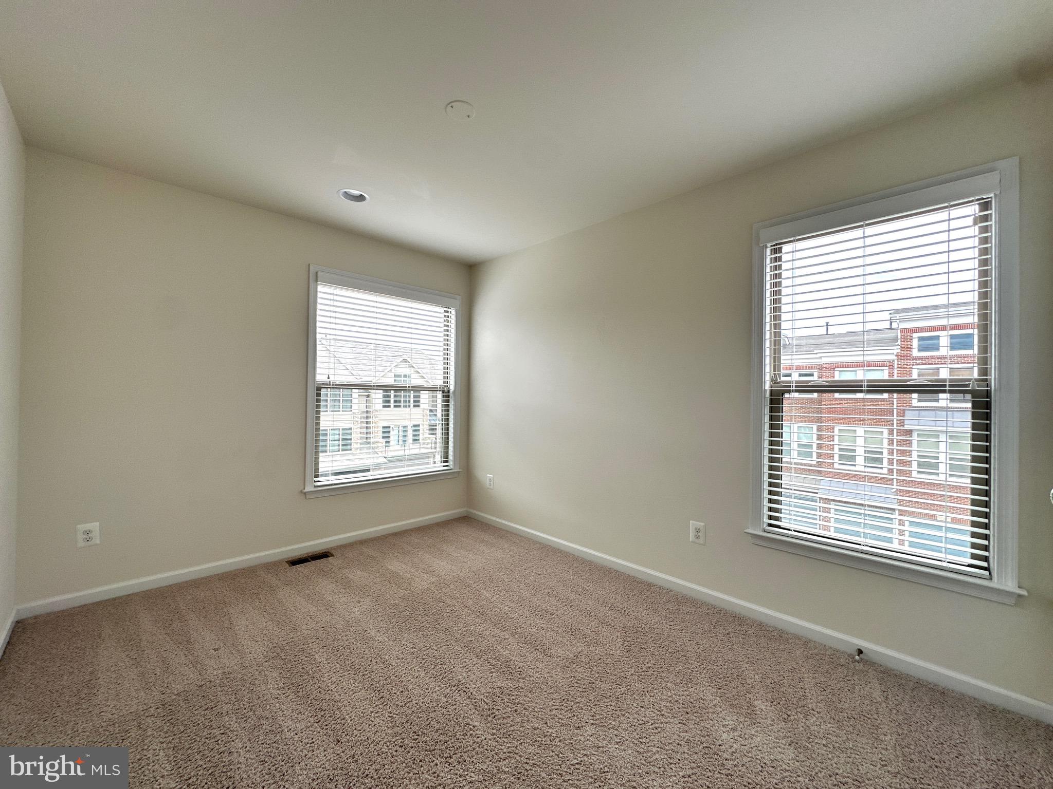23451 Epperson Square Brambleton, VA 20148 - Photo 32 of 42 a view of an empty room with a window