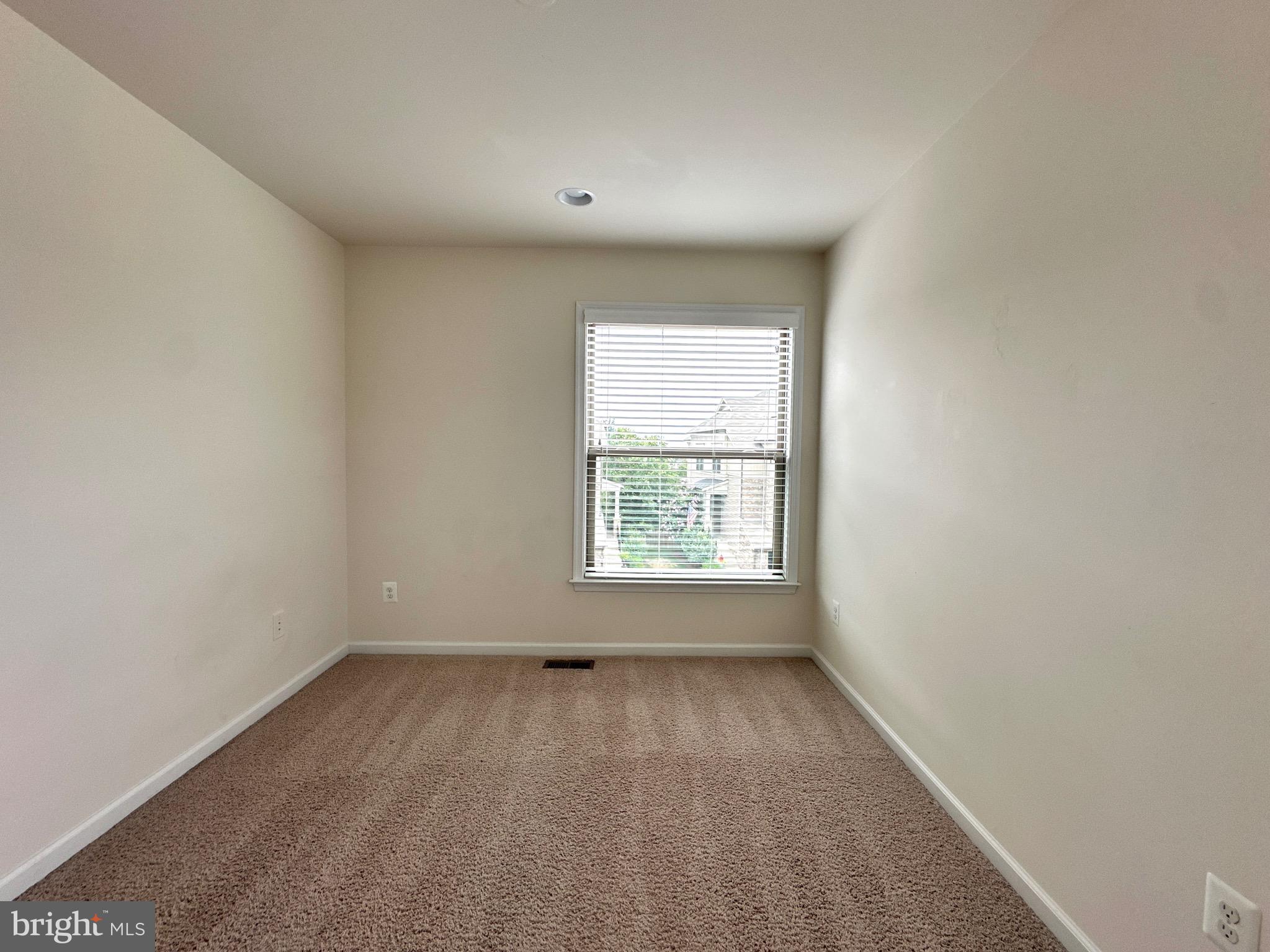 23451 Epperson Square Brambleton, VA 20148 - Photo 33 of 42 an empty room with a window