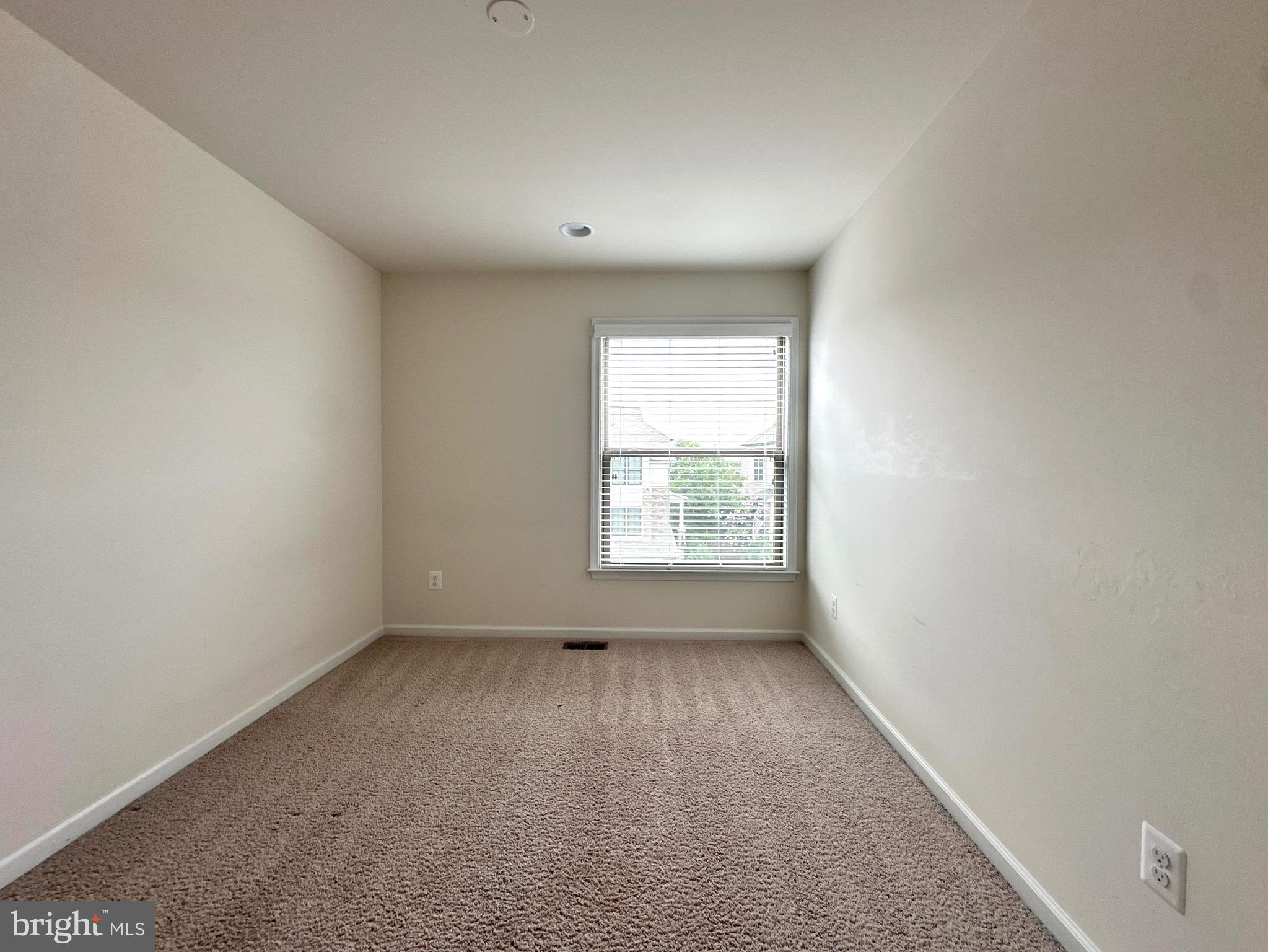 23451 Epperson Square Brambleton, VA 20148 - Photo 37 of 42 an empty room with a window