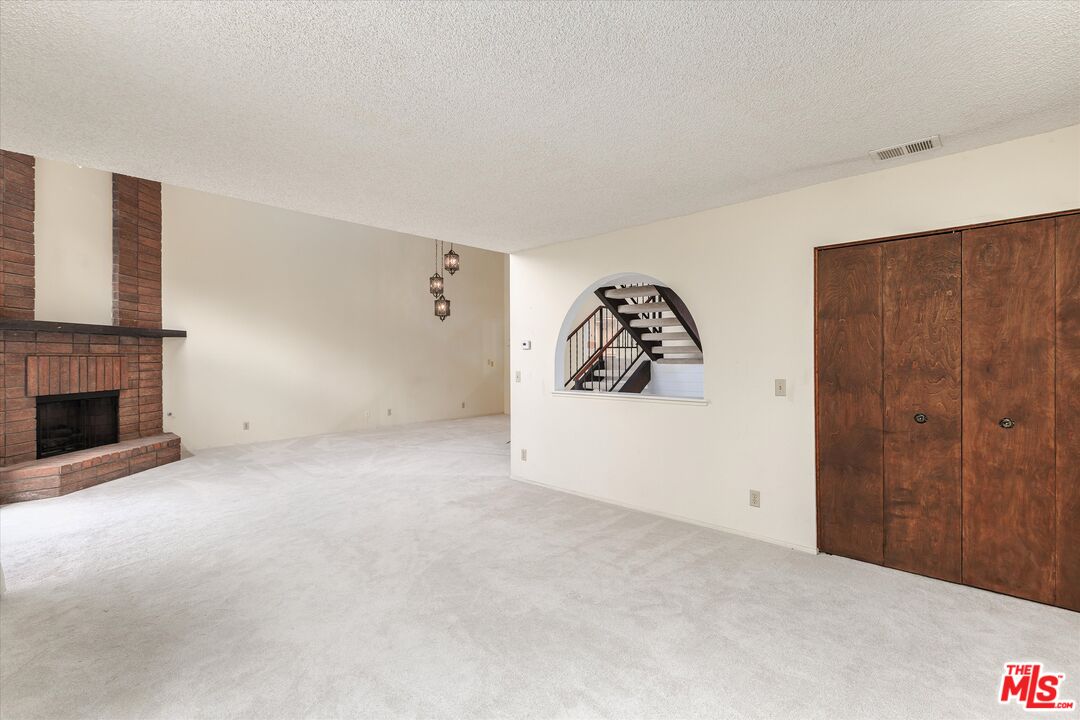 1108 Via Mavis Santa Maria, CA 93455 - Photo 6 of 28 a view of a livingroom with a fireplace