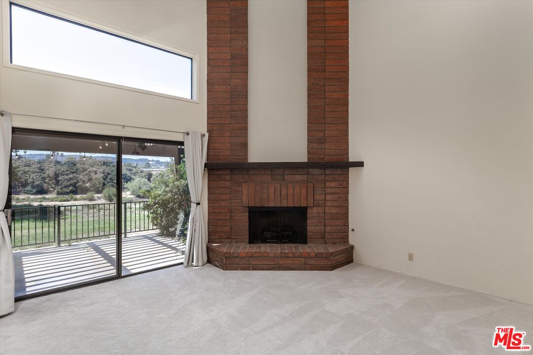 1108 Via Mavis Santa Maria, CA 93455 - Photo 7 of 28 a view of fireplace and window in an empty room