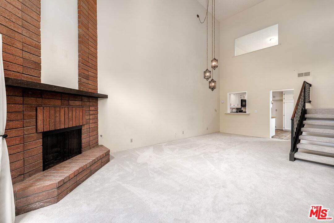 1108 Via Mavis Santa Maria, CA 93455 - Photo 9 of 28 a view of empty room with fireplace