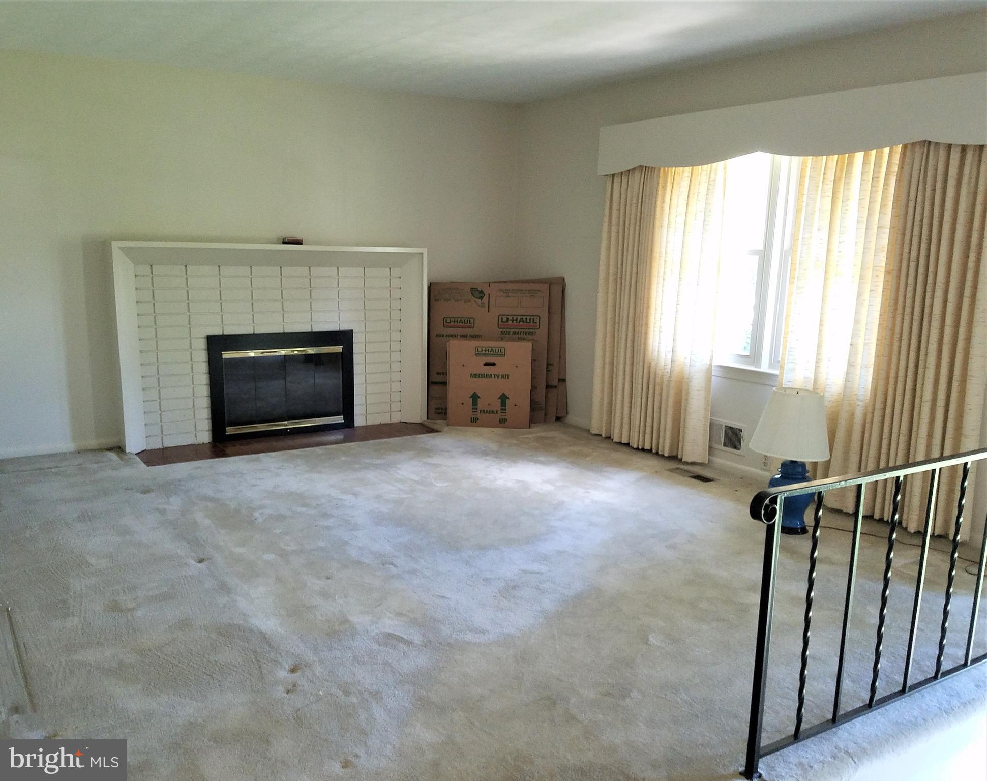 5903 Windham Road Laurel, MD 20707 - Photo 2 of 16 Hardwood floors under this carpet.