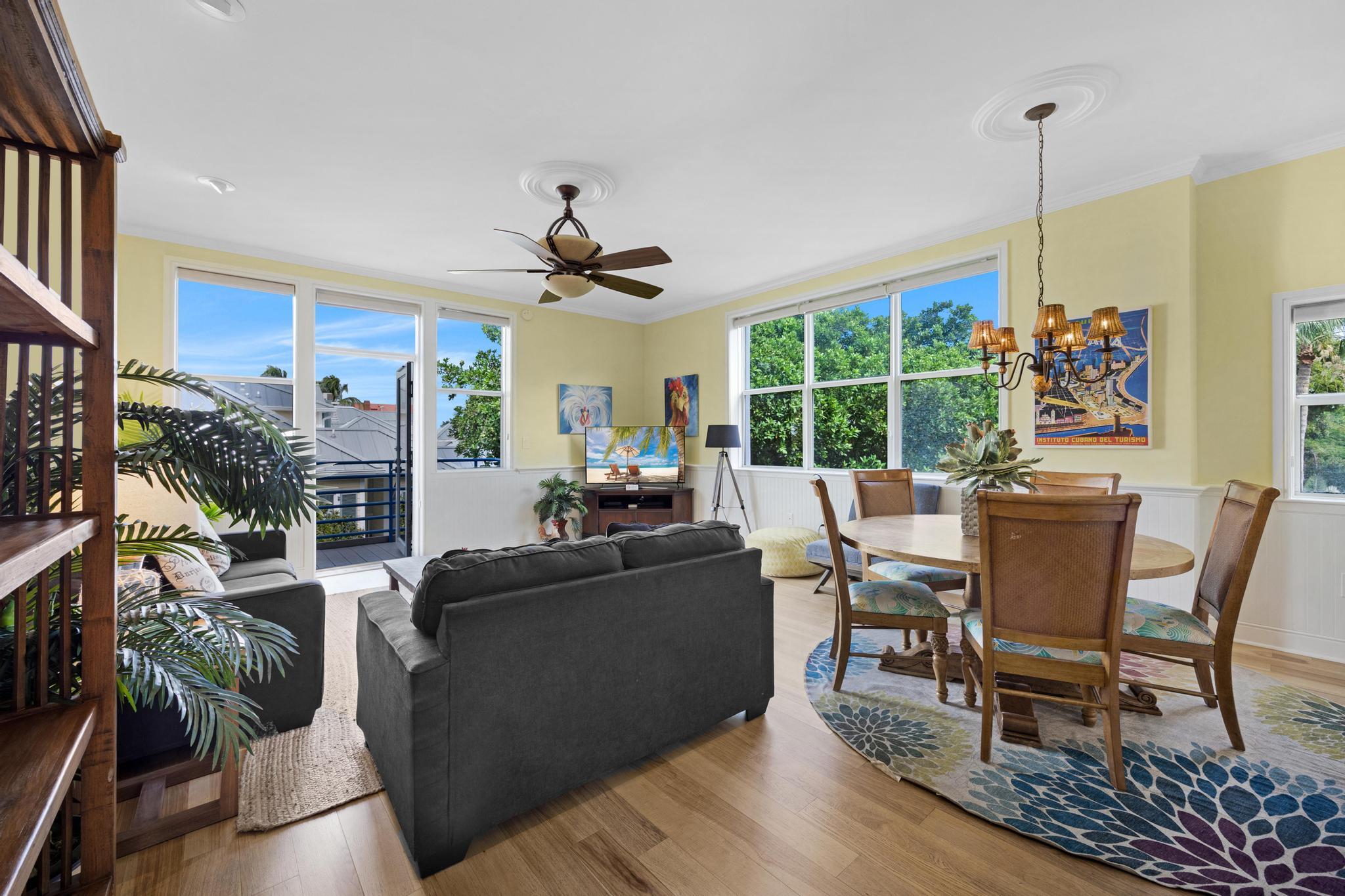 115 Front Street, Unit 301 Key West, FL 33040 - Photo 16 of 52 a view of a dining room with furniture window and outside view