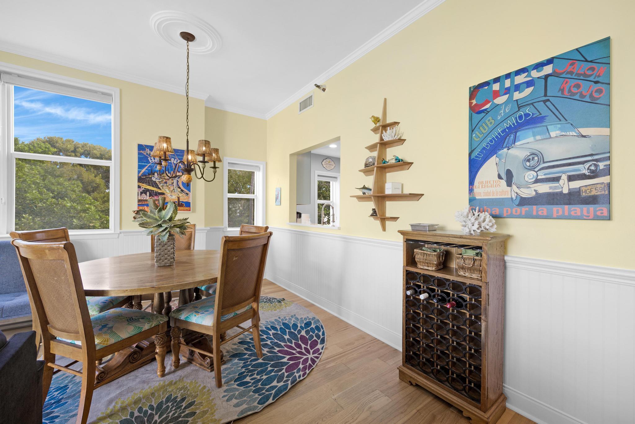115 Front Street, Unit 301 Key West, FL 33040 - Photo 18 of 52 a view of a dining room with furniture window and outside view