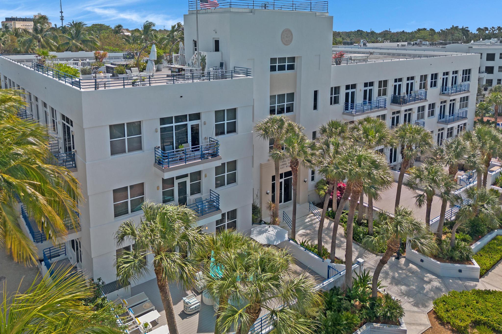 115 Front Street, Unit 301 Key West, FL 33040 - Photo 42 of 52 a view of a building with a lot of windows