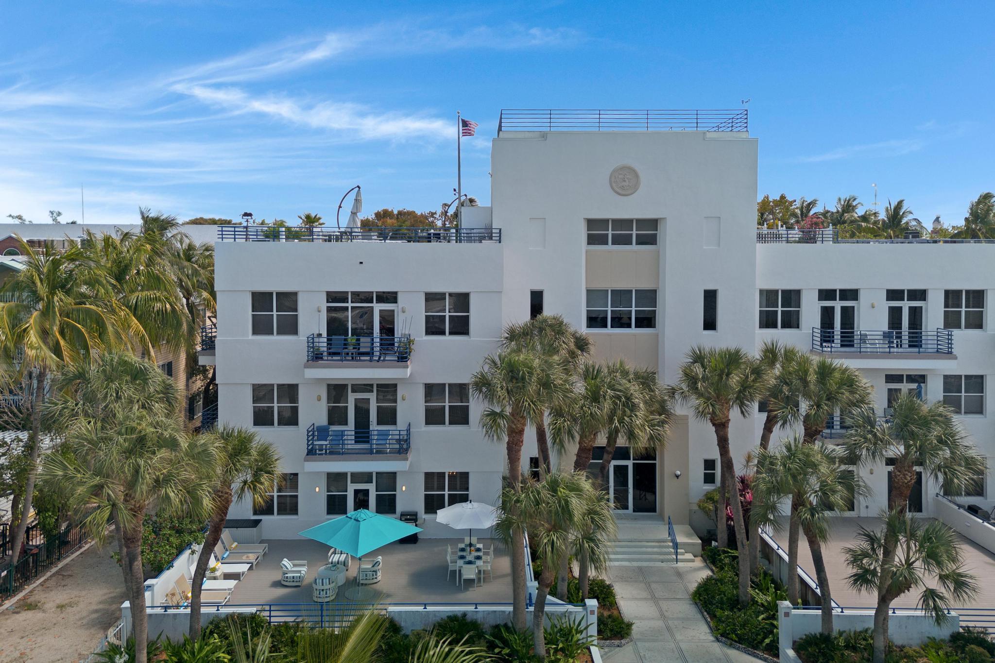 115 Front Street, Unit 301 Key West, FL 33040 - Photo 45 of 52 a view of multiple houses with a street