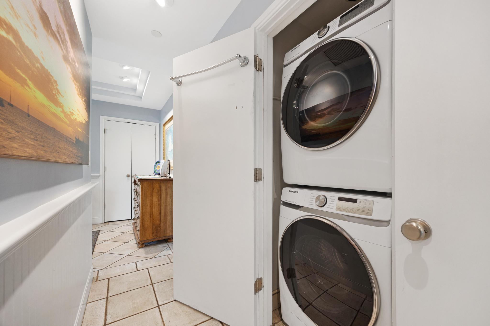 115 Front Street, Unit 301 Key West, FL 33040 - Photo 10 of 52 a view of a hallway with washer and dryer