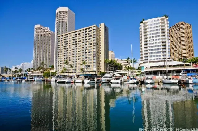 a view of water with tall building