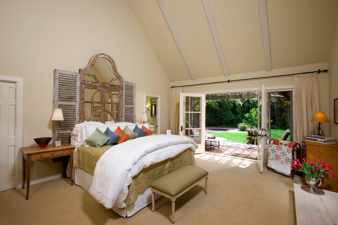 610 San Ysidro Road Montecito, CA 93108 - Photo 6 of 8 a bedroom with bed and glass windows
