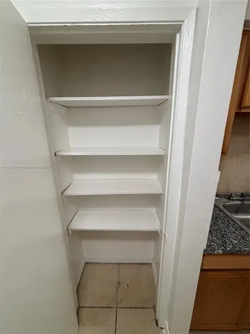 a view of storage and utility room