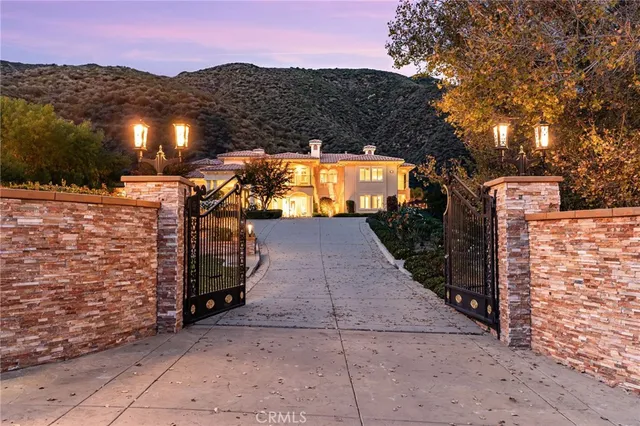 a view of a swimming pool with an outdoor seating