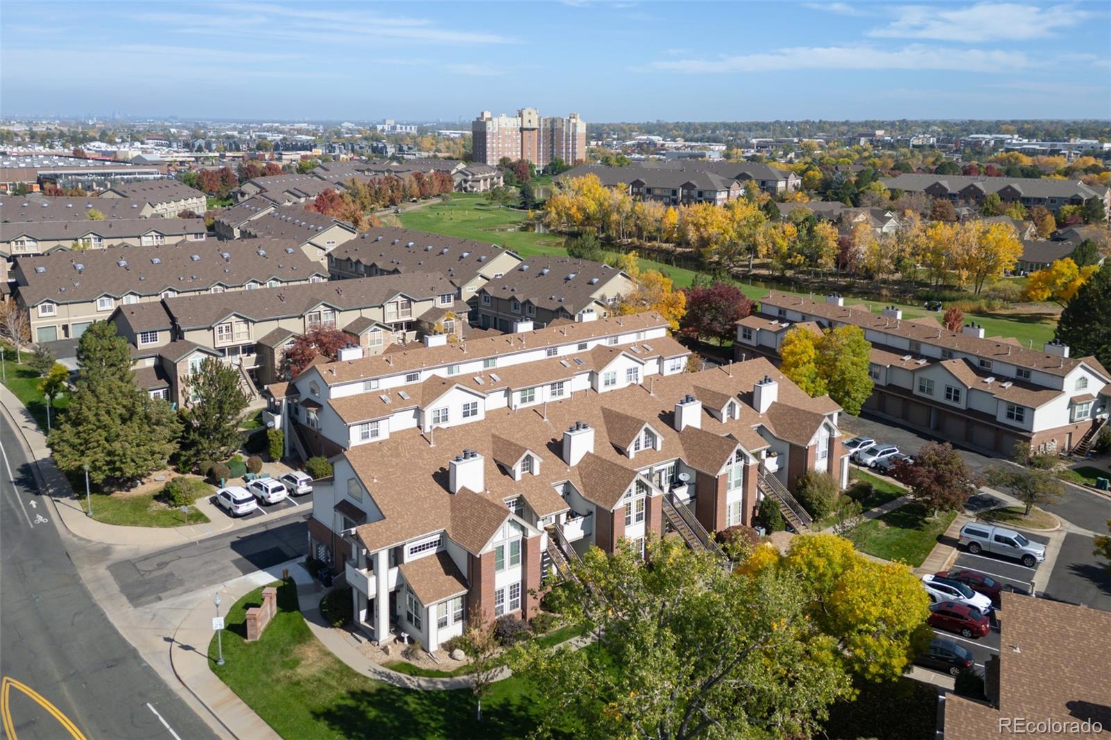 3016 West Prentice Avenue, Unit D Littleton, CO 80123 - Photo 22 of 28 a city view with tall buildings