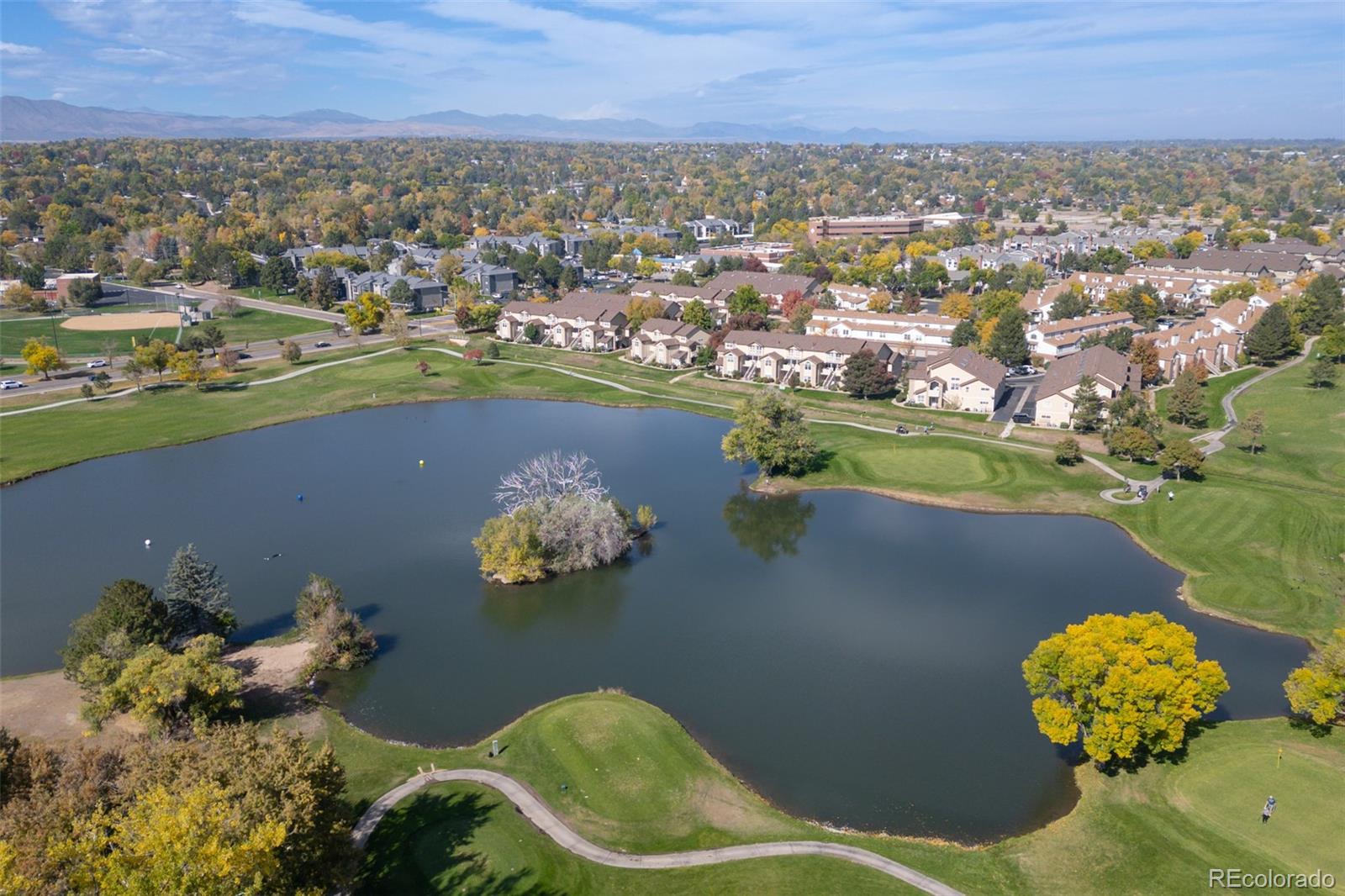 3016 West Prentice Avenue, Unit D Littleton, CO 80123 - Photo 25 of 28 an aerial view of a house with a lake view