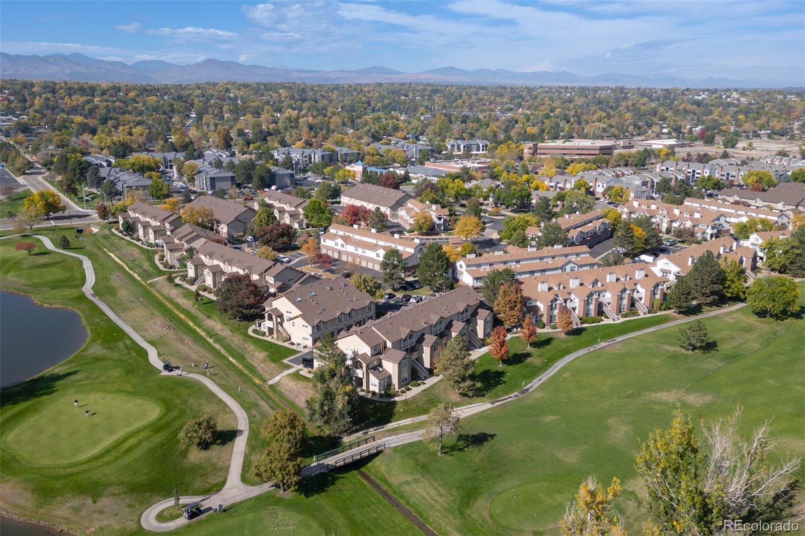 3016 West Prentice Avenue, Unit D Littleton, CO 80123 - Photo 26 of 28 an aerial view of a residential houses with outdoor space and trees