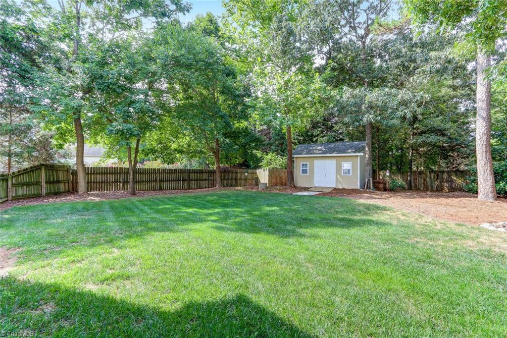 3800 Rockingham Road South Greensboro, NC 27407 - Photo 29 of 30 BACK YARD W/STORAGE SHED