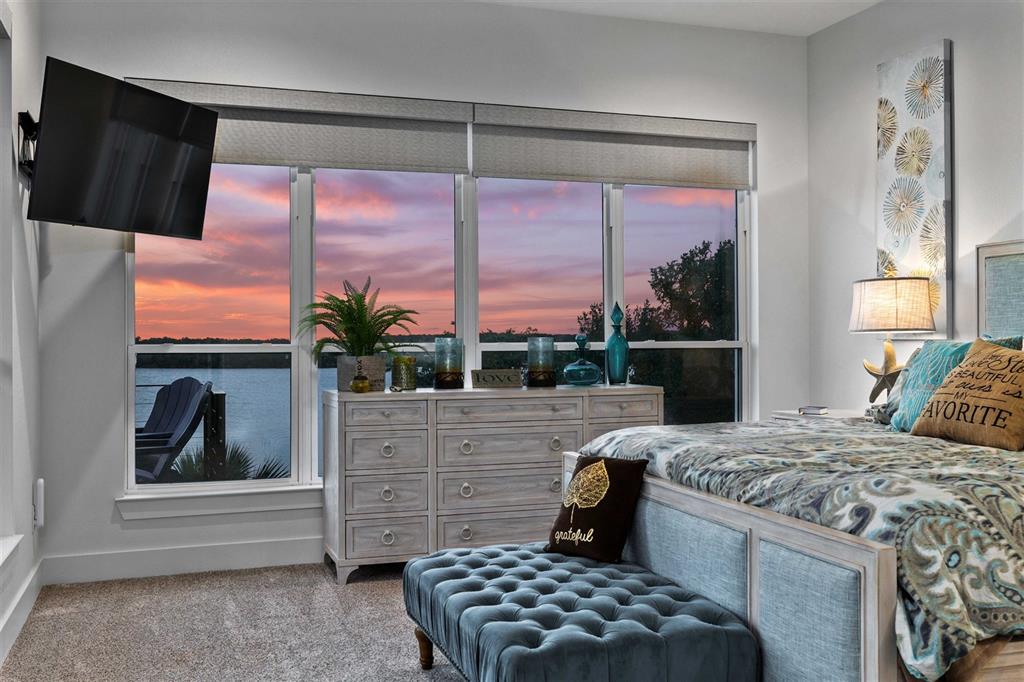 582 Oak Point Drive May, TX 76857 - Photo 17 of 37 a bedroom with a bed and a window