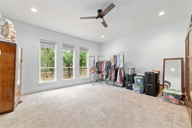 a bathroom with a toilet sink shower and mirror
