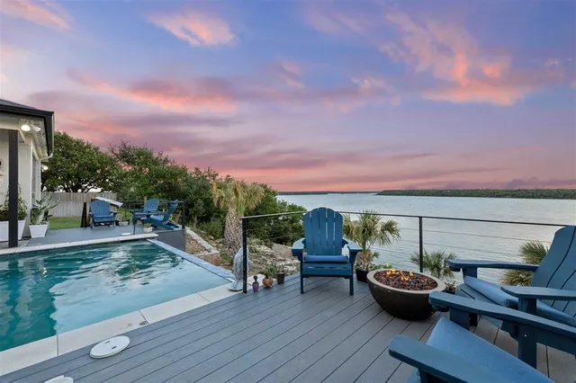 a view of outdoor space with wooden floor