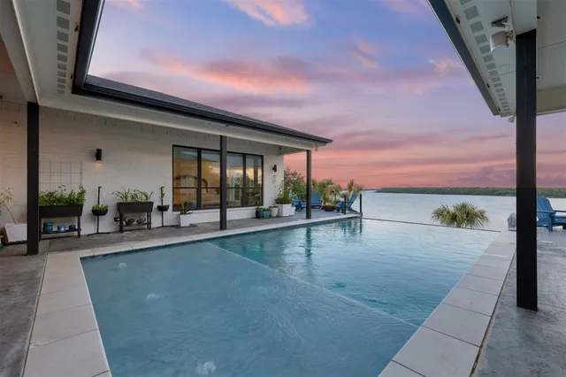 a view of a lake with a city