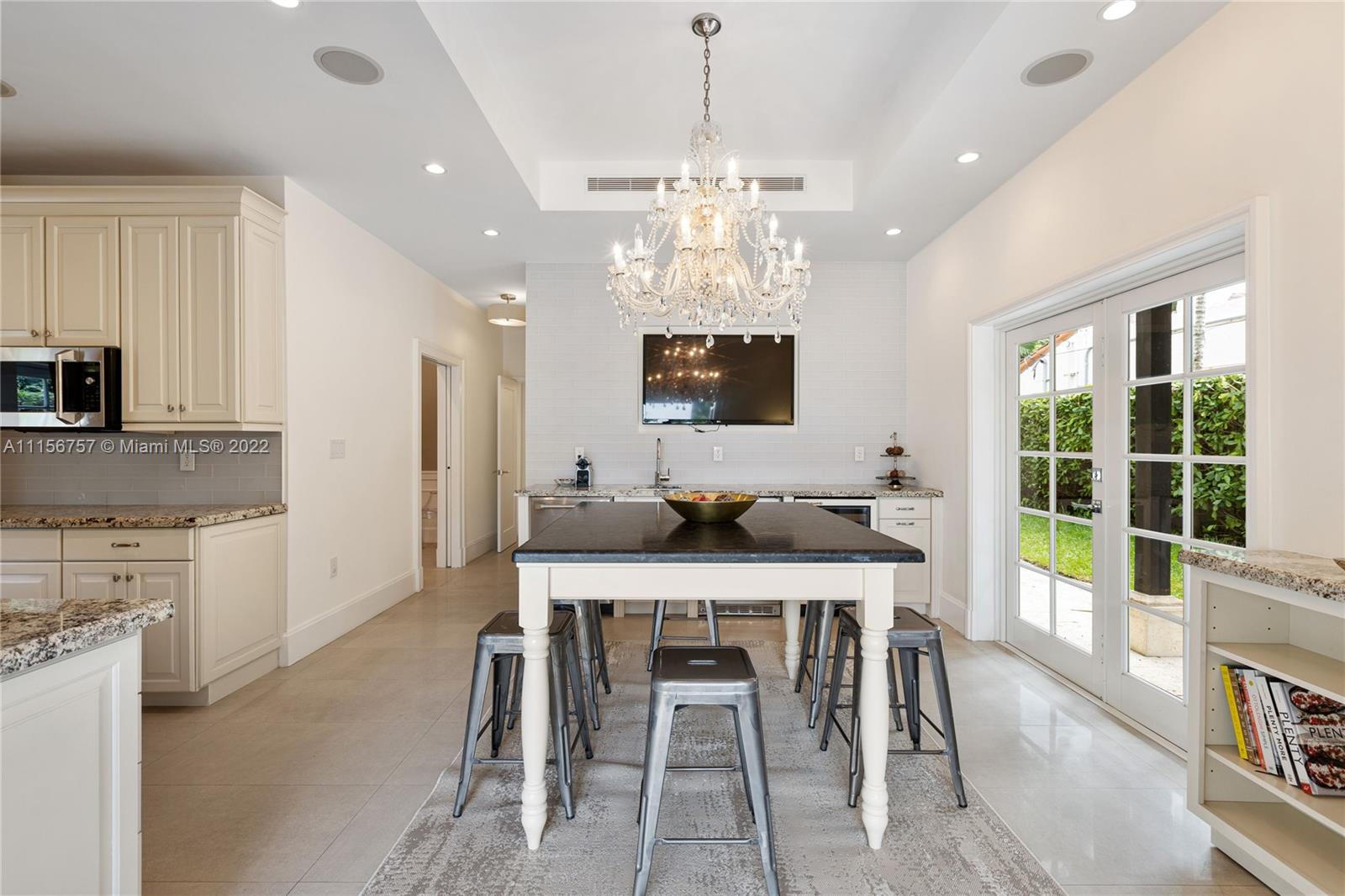 2914 Alton Road Miami Beach, FL 33140 - Photo 11 of 70 a view of a dining room with furniture window and outside view