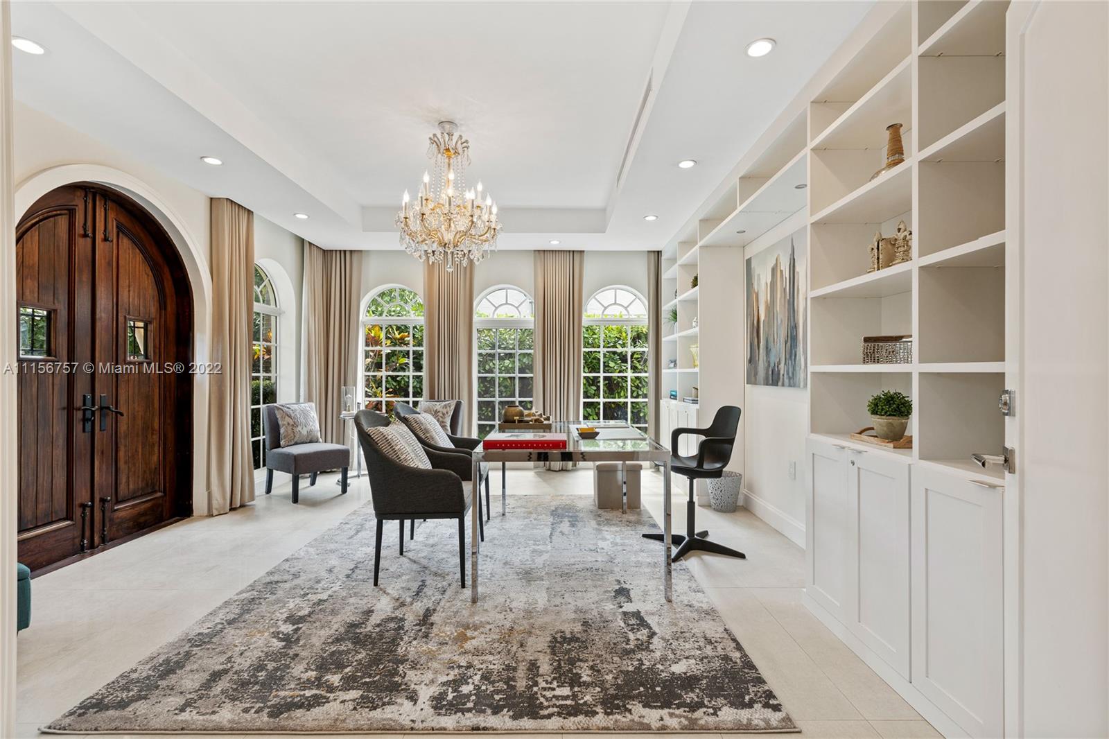 2914 Alton Road Miami Beach, FL 33140 - Photo 21 of 70 a living room with furniture or outdoor and a dining table