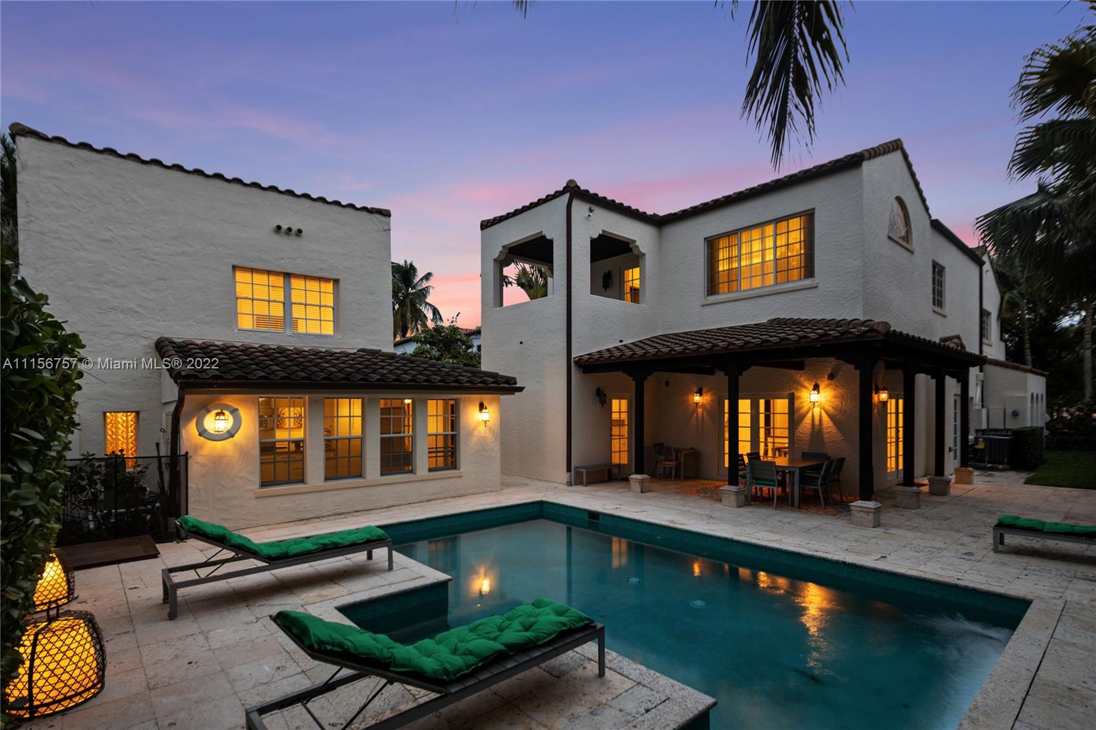 2914 Alton Road Miami Beach, FL 33140 - Photo 4 of 70 a view of a house with swimming pool and sitting area