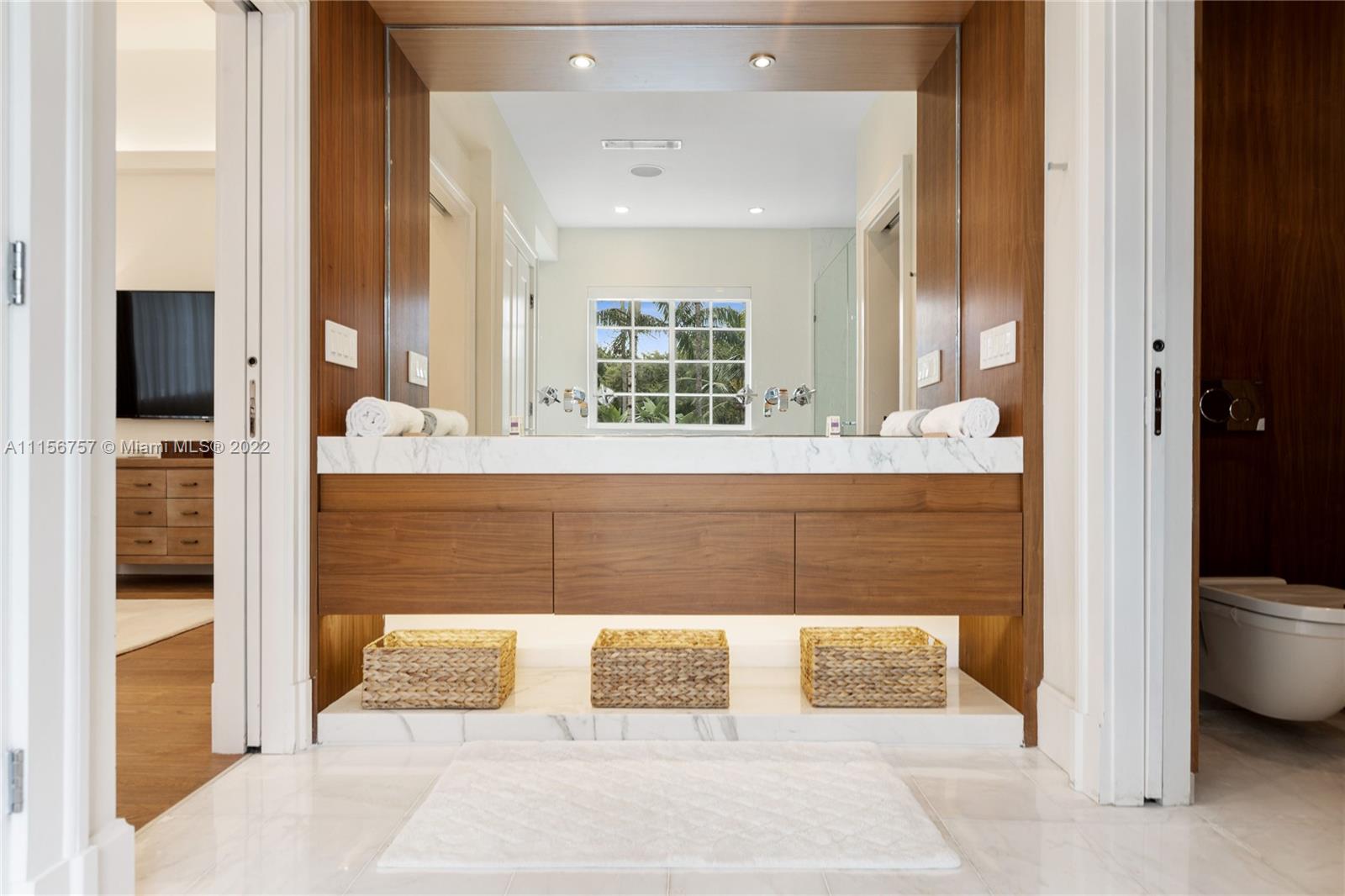 2914 Alton Road Miami Beach, FL 33140 - Photo 44 of 70 a bathroom with a bathtub and a shower