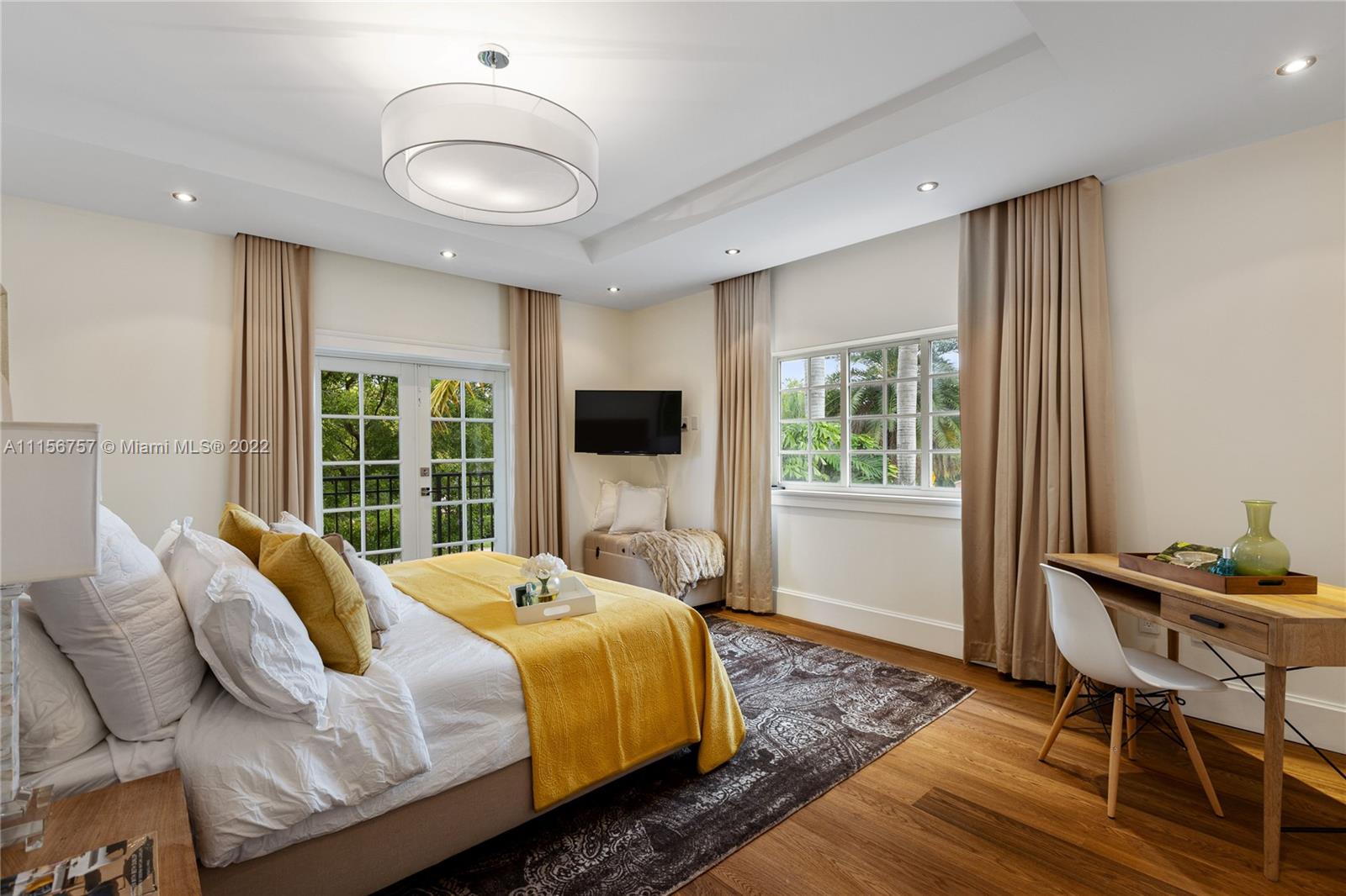 2914 Alton Road Miami Beach, FL 33140 - Photo 47 of 70 a bedroom with a bed and a window