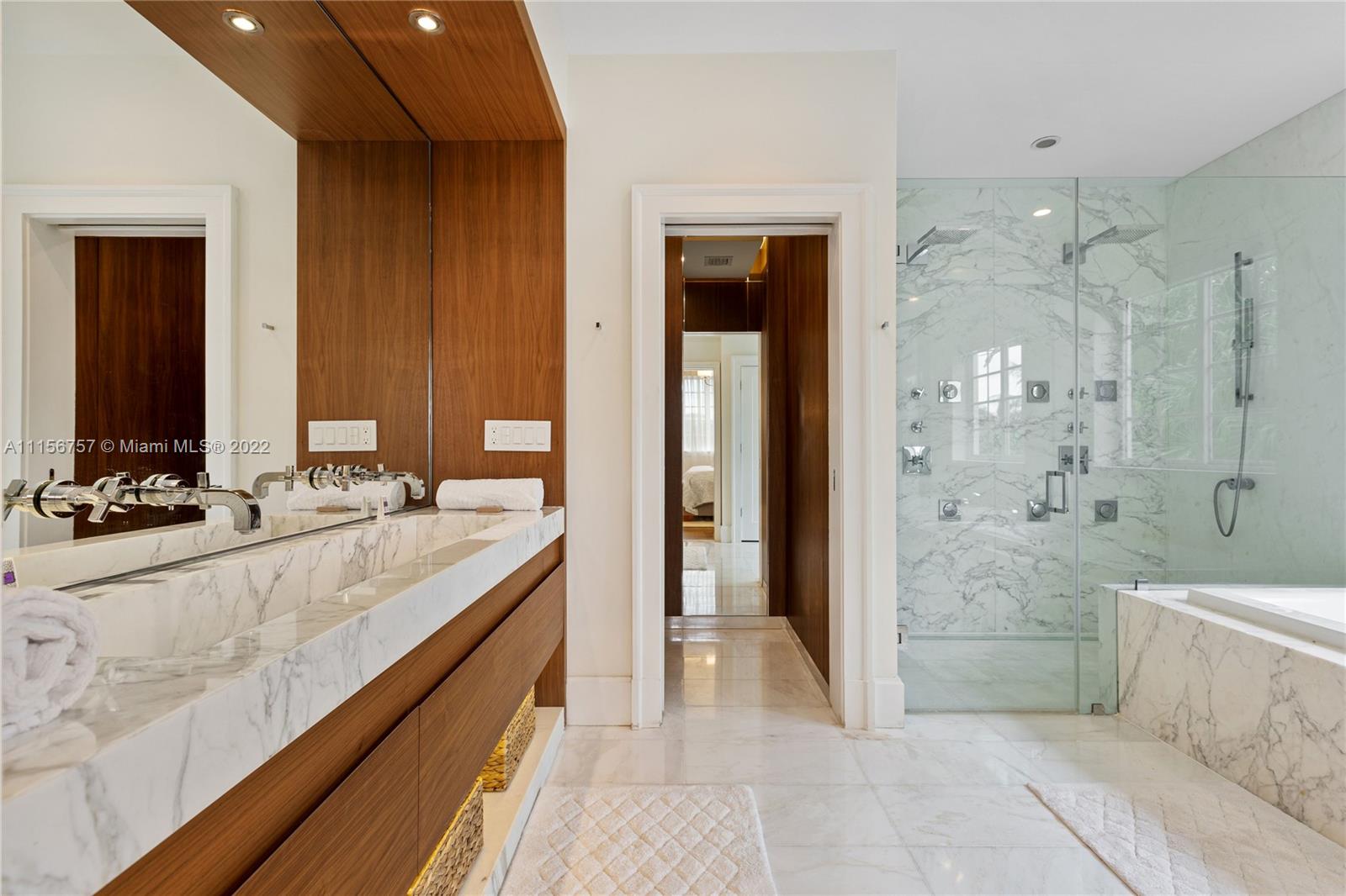 2914 Alton Road Miami Beach, FL 33140 - Photo 5 of 70 a bathroom with a granite countertop sink a toilet and shower