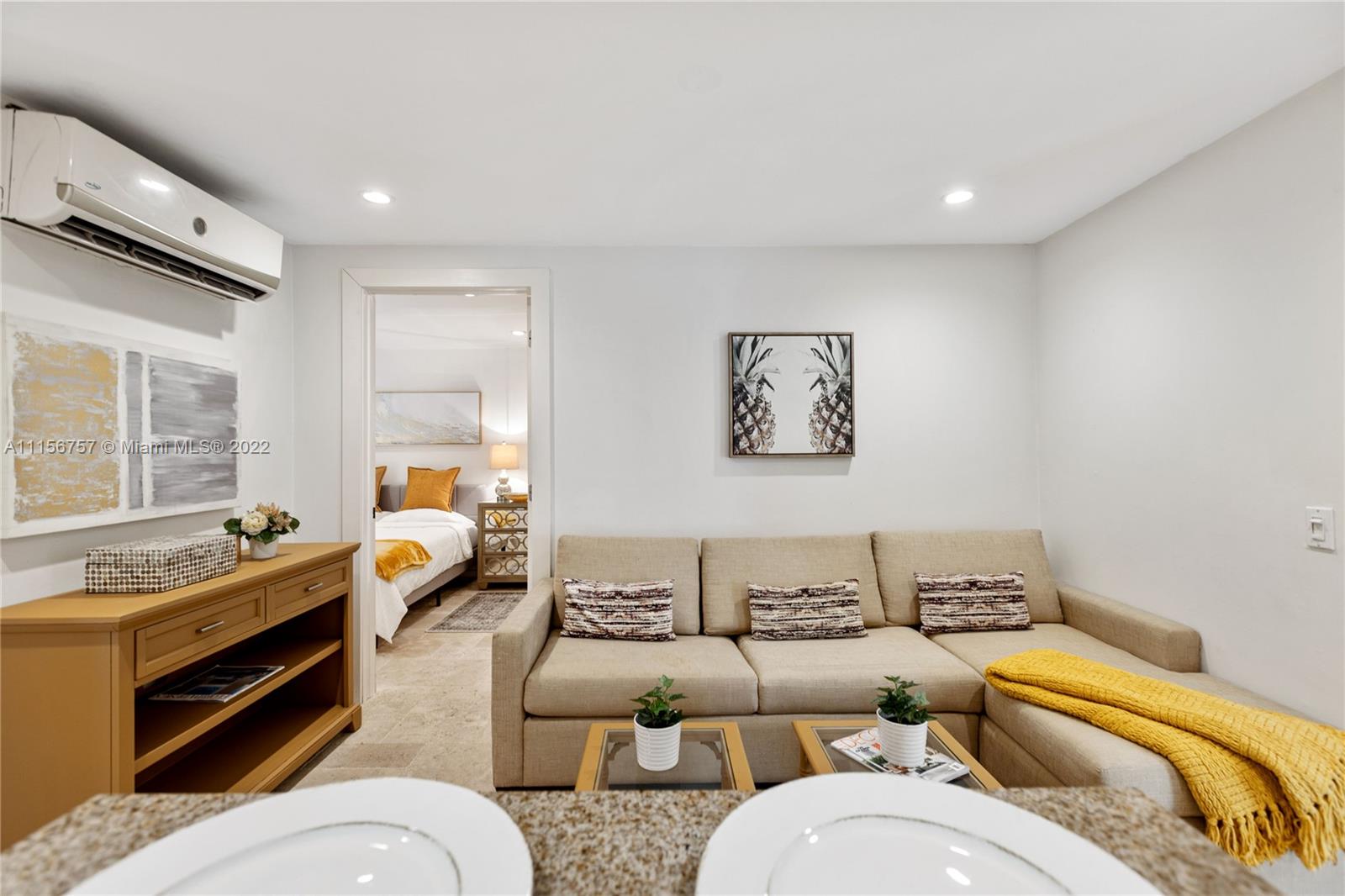 2914 Alton Road Miami Beach, FL 33140 - Photo 58 of 70 a living room with furniture and a window