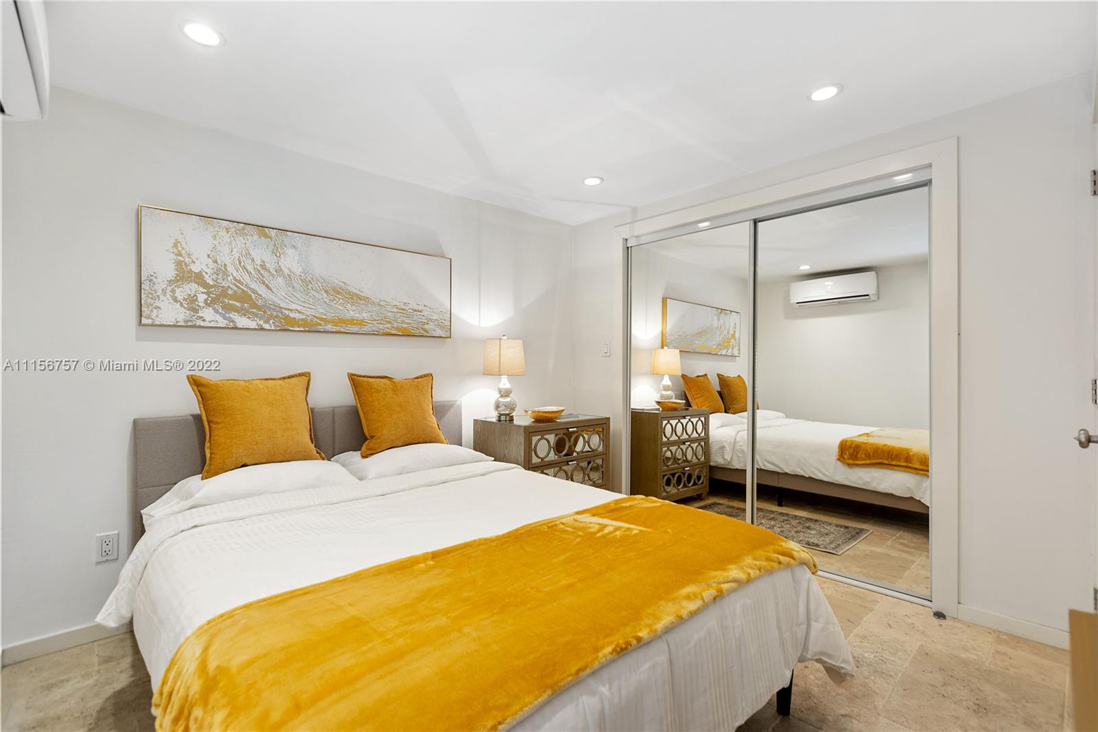 2914 Alton Road Miami Beach, FL 33140 - Photo 60 of 70 a bedroom with a bed and walk in closet