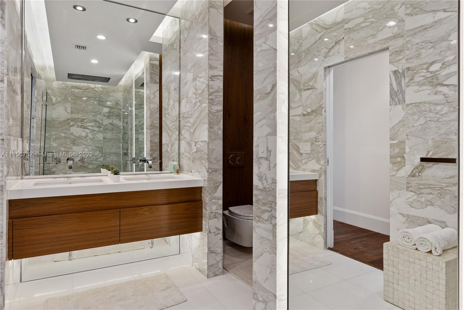 2914 Alton Road Miami Beach, FL 33140 - Photo 8 of 70 a bathroom with a bathtub and a sink