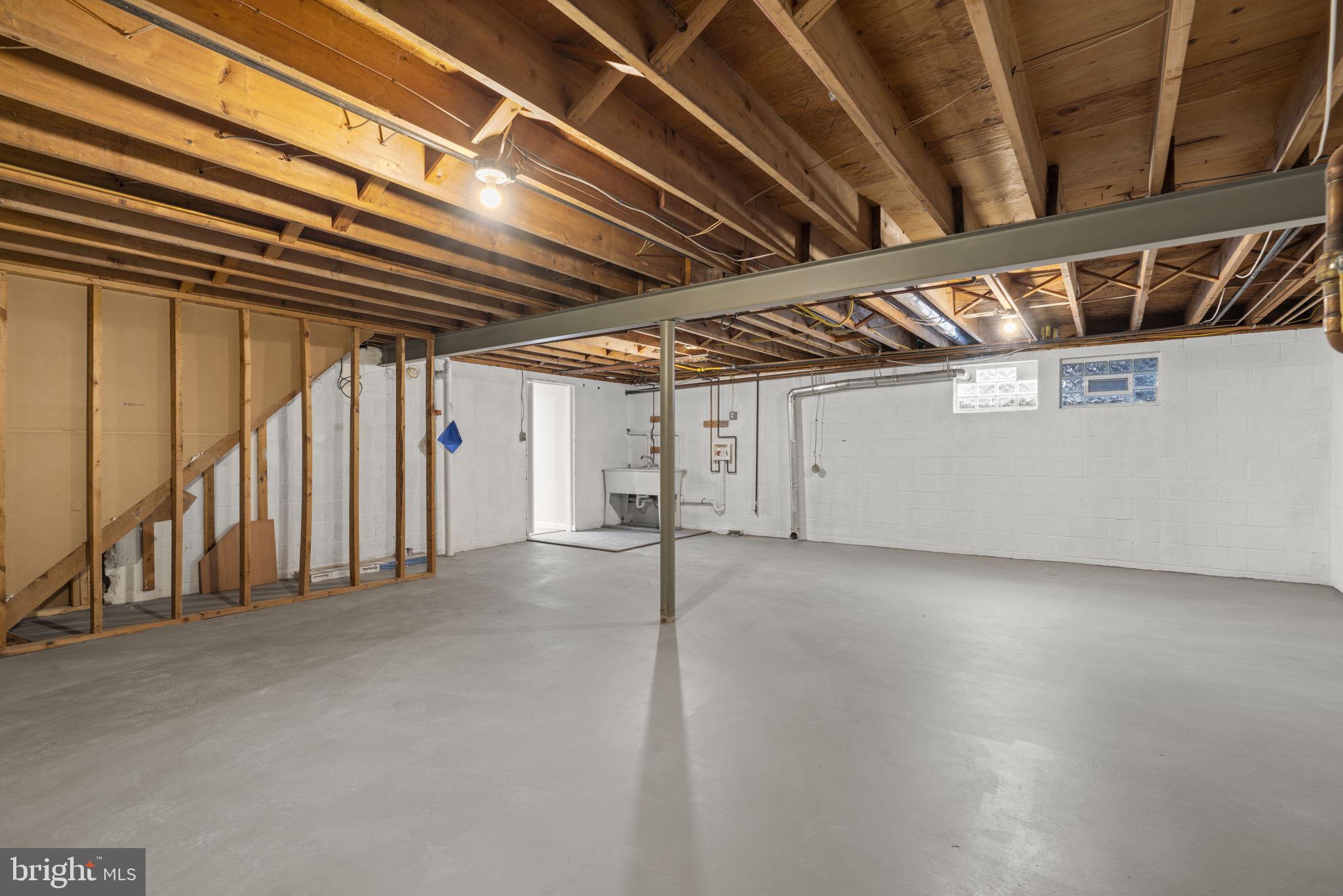 9122 Northfield Road Ellicott City, MD 21042 - Photo 46 of 60 Lower Level Storage w/ 2nd washer & dryer hookup