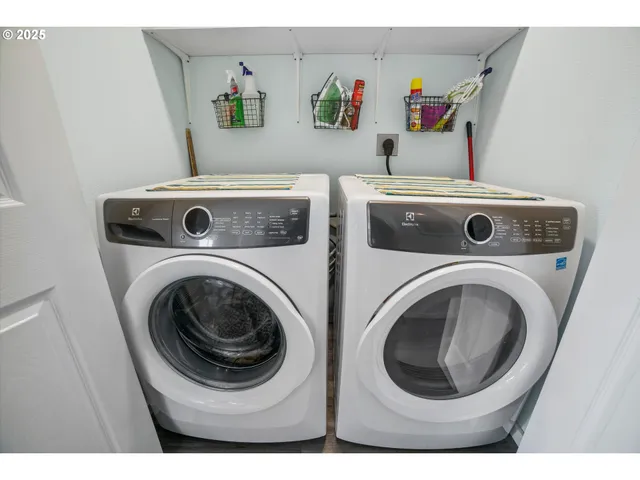 a utility room with dryer and washer