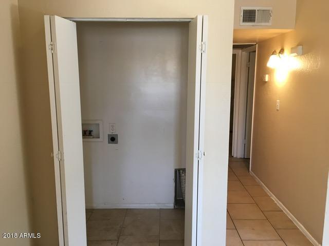 7110 North 68th Avenue, Unit 1 Glendale, AZ 85303 - Photo 14 of 22 a view of elevator with hallway