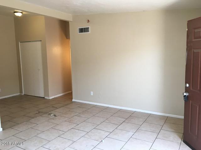 7110 North 68th Avenue, Unit 1 Glendale, AZ 85303 - Photo 5 of 22 a view of an empty room