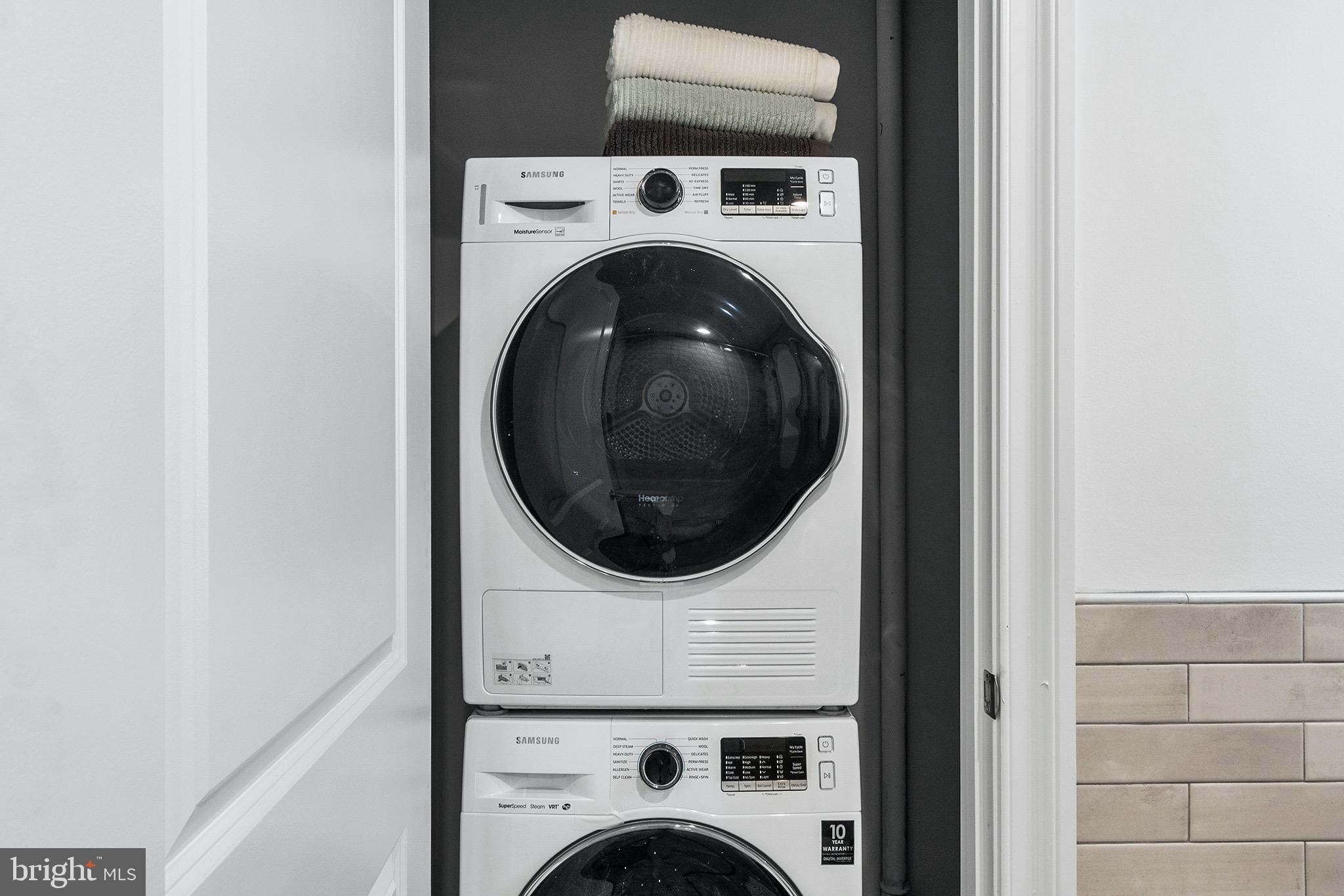 58 North 23rd Street, Unit 1109 Philadelphia, PA 19103 - Photo 16 of 30 a utility room with dryer and washer