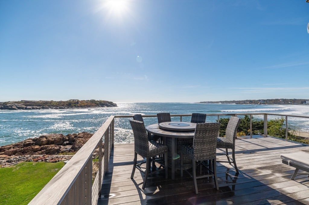 25 Salt Island Road Gloucester, MA 01930 - Photo 12 of 37 a view of a dining room with furniture and wooden floor